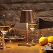 LED oppladbar bordlampe Nuindie mini, USB-C, bronse, IP54, dimbar.