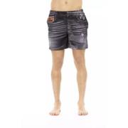 Trykte strandshorts med sidelommer