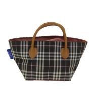 Pre-owned Fabric handbags