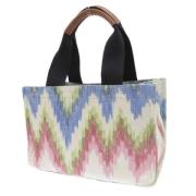 Pre-owned Fabric handbags