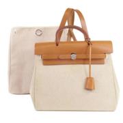 Pre-owned Fabric handbags