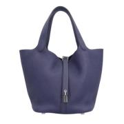 Pre-owned Fabric handbags