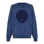 Rillet sweatshirt med 'Coin' broderi