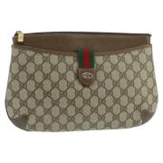 Pre-owned Canvas clutches